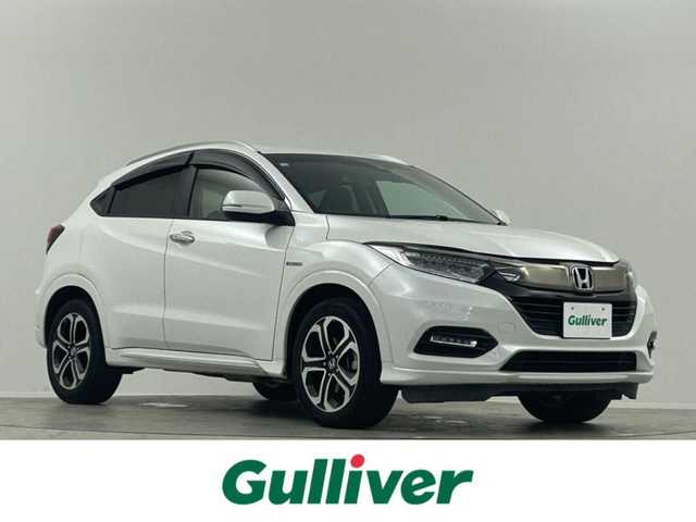 ホンダ ヴェゼル ハイブリッド Z ホンダセンシング 埼玉県 2020(令2)年 6.9万km プラチナホワイトパール 社外ナビ　衝突軽減　ＡＣＣ　バックカメラ　ＥＴＣ　ハーフレザー　前席シートヒーター　前後ドラレコ　パドルシフト　スマートキー　純正フロアマット　純正１７インチＡＷ　オートライト　ＣＤ　ＤＶＤ　ＢＴ