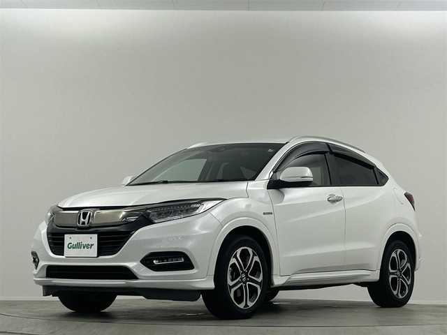 ホンダ ヴェゼル ハイブリッド Z ホンダセンシング 埼玉県 2020(令2)年 6.9万km プラチナホワイトパール 社外ナビ　衝突軽減　ＡＣＣ　バックカメラ　ＥＴＣ　ハーフレザー　前席シートヒーター　前後ドラレコ　パドルシフト　スマートキー　純正フロアマット　純正１７インチＡＷ　オートライト　ＣＤ　ＤＶＤ　ＢＴ