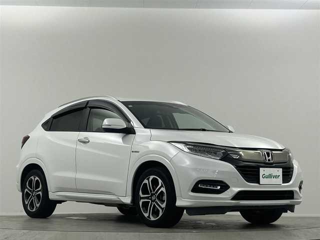 ホンダ ヴェゼル ハイブリッド Z ホンダセンシング 埼玉県 2020(令2)年 6.9万km プラチナホワイトパール 社外ナビ　衝突軽減　ＡＣＣ　バックカメラ　ＥＴＣ　ハーフレザー　前席シートヒーター　前後ドラレコ　パドルシフト　スマートキー　純正フロアマット　純正１７インチＡＷ　オートライト　ＣＤ　ＤＶＤ　ＢＴ