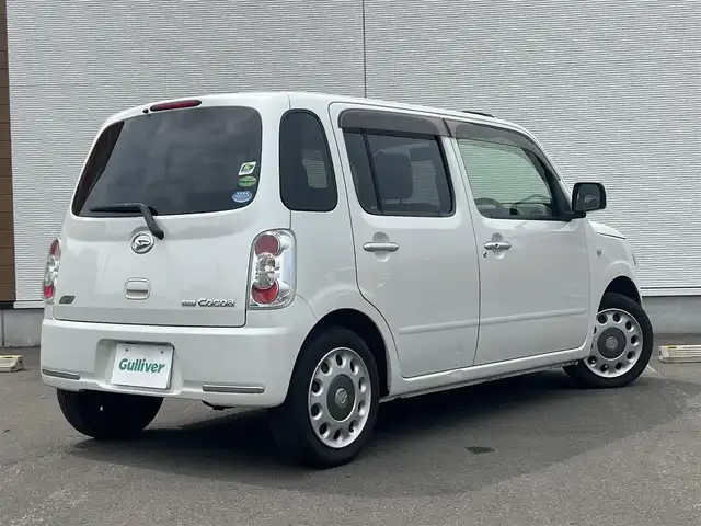 ダイハツ ミラ ココア X 秋田県 2012(平24)年 6.8万km パールホワイトⅢ ４WD/社外ナビ/フルセグ/スマートキー/アイドリングストップ/純正フロアマット/純正ドアバイザー/オートエアコン/パワーステアリング/パワーウィンドウ/レベライザー/盗難防止装置/電動格納ミラー/保証書/取扱説明書/記録簿