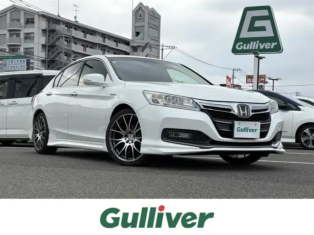 ホンダ アコード ハイブリッド EX 大分県 2015(平27)年 6.2万km ホワイトオーキッドパール ・ナビ(HDD/CD/DVD/BT/USB)/・バックカメラ/・フルセグテレビ/・衝突被害軽減ブレーキ/・レーダークルーズコントロール/・ETC/・パワーシート/・シートヒーター/・レザーシート/・シートメモリー/・スマートキー/・プッシュスタート/・RAYSホイール/・MUGENフロアマット
