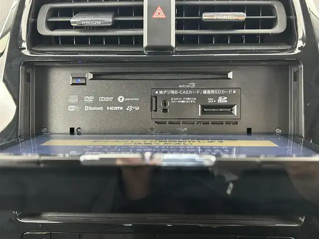 トヨタ プリウス A ツーリングセレクション 千葉県 2016(平28)年 2.5万km エモーショナルレッド 禁煙車/トヨタセーフティセンス/・レーンディパーチャーアラート/・レーンキープアシスト/・ヘッドアップディスプレイ/・ブラインドスポットモニター/・プリクラッシュセーフティ/・プリクラッシュセーフティブレーキ/・レーダークルーズコントロール/・クリアランスソナー/ビックX９インチアルパインメモリナビ/・型番：X9V/・CD/DVD/Bluetooth/フルセグTV/・バックカメラ/・ビルトインETC/革巻きステアリング/・ステアリングスイッチ/レザーシート/・DNシートヒーター/純正フロアマット/純正１７インチAW/オートライト/・LEDヘッドライト/・LEDフォグランプ