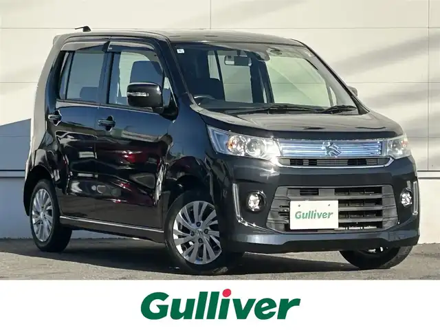 スズキ ワゴンＲ スティングレー X 佐賀県 2015(平27)年 10万km ブルーイッシュブラックパール3 衝突被害軽減システム/社外ナビ/・フルセグTV/BT/CD/DVD/純正14インチAW/運転席シートヒーター/HIDヘッドライト/オートライト/フォグランプ/プッシュスタート/スペアキー×１/保証書/取扱説明書