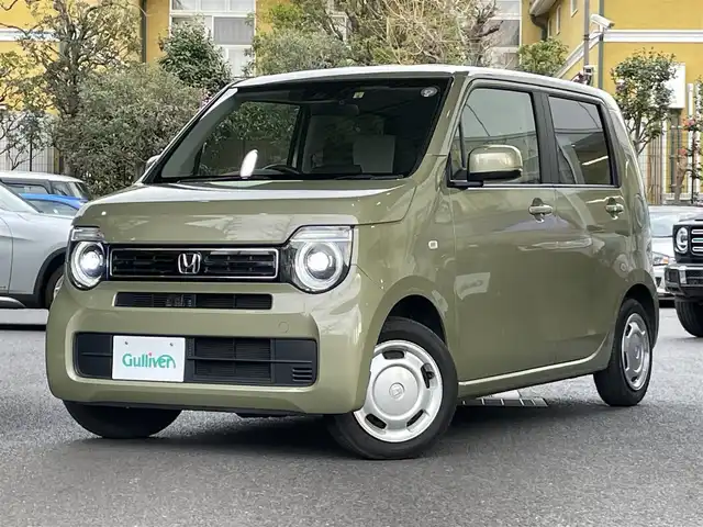 ホンダ Ｎ ＷＧＮ L ホンダセンシング 東京都 2022(令4)年 1.3万km ガーデングリーンM ホンダセンシング（安全運転支援システム）詳細は検査員記入欄参照/保証書・取説・ナビ取説/EGプッシュスタート・スマートキー×２/プラズマクラスター付エアコン/アイドリングストップ　/運転席シートヒーター/シートリフター/純正メモリインターナビ/フルセグTV/DVD/CD/SD/BT/USB/ワイドバックカメラ/ビルトインETC/純正ドライブレコーダー/パーキングセンサー（リアのみ）/充電用USB×２/LEDヘッドライト・ライトレベライザー・オートライト/ウィンカーミラー（AUTO格納機能）/AUTO HOLD/横滑り防止装置