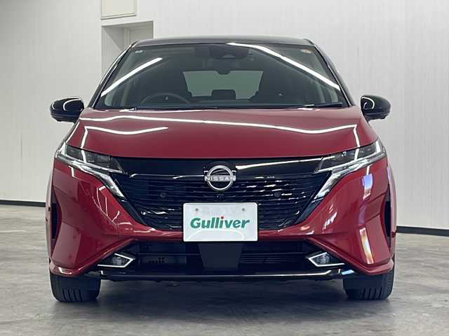 日産 オーラ G レザーエディション 長崎県 2022(令4)年 3.1万km ガーネットレッド/スーパーブラック 2トーン ワンオーナー/禁煙車/日産純正ナビ/（フルセグTV、DVD/Bluetooth）/ドライブレコーダー/ETC2.0/全方位バックカメラ/デジタルインナーミラー/オートライト/純正LEDヘッドランプ/衝突軽減システム/前後コーナーセンサー/17インチ純正AW/純正フロアマット/ステアリングスイッチ/プッシュスタート/スペアキー/取説、保証書