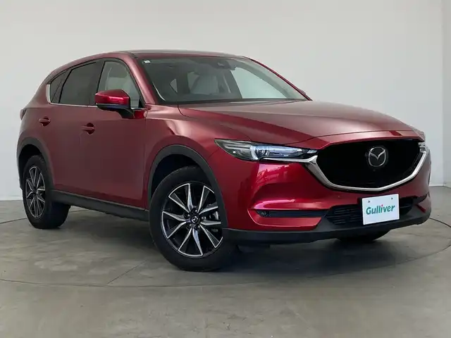マツダ ＣＸ－５ XD Lパッケージ 新潟県 2021(令3)年 3.1万km ソウルレッドクリスタルM 純正メモリナビ（Bluetooth・USB）/アラウンドビューモニター　/衝突被害軽減システム　/合皮シート　/前席パワーシート/前席シートヒーター　/D席メモリーシート　/電動リアゲート/純正前後ドライブレコーダー　/LEDオートライト　/オートマチックハイビーム/レーンキープアシスト　/追従クルーズコントロール/前後コーナーセンサー/ブラインドスポットモニター/ヘッドアップディスプレイ/ETC/アイドリングストップ/ステアリングヒーター/レザーステアリング/パドルシフト/MTモード付AT/純正フロアマット/純正１９インチアルミホイール/スマートキー/スペアキー/保証書/取扱説明書