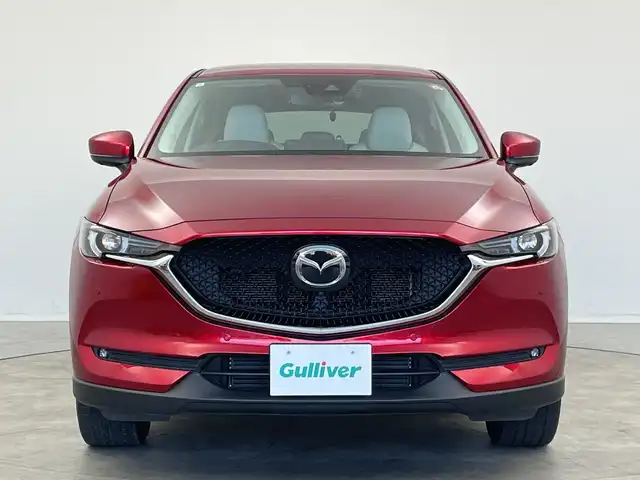 マツダ ＣＸ－５ XD Lパッケージ 新潟県 2021(令3)年 3.1万km ソウルレッドクリスタルM 純正メモリナビ（Bluetooth・USB）/アラウンドビューモニター　/衝突被害軽減システム　/合皮シート　/前席パワーシート/前席シートヒーター　/D席メモリーシート　/電動リアゲート/純正前後ドライブレコーダー　/LEDオートライト　/オートマチックハイビーム/レーンキープアシスト　/追従クルーズコントロール/前後コーナーセンサー/ブラインドスポットモニター/ヘッドアップディスプレイ/ETC/アイドリングストップ/ステアリングヒーター/レザーステアリング/パドルシフト/MTモード付AT/純正フロアマット/純正１９インチアルミホイール/スマートキー/スペアキー/保証書/取扱説明書