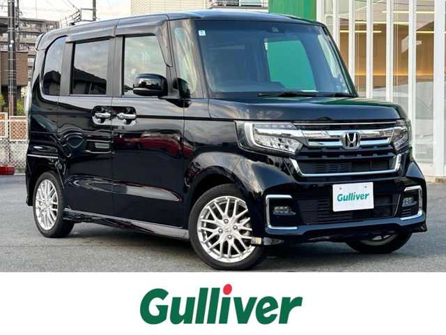 ホンダ Ｎ ＢＯＸ カスタム EX ターボ 静岡県 2022(令4)年 2.1万km クリスタルブラックパール 純正SDナビ（BT接続、CDチェンジャー、フルセグTV、DVD再生機能有り）/前後ドライブレコーダー/バックカメラ/両側パワースライドドア/純正アルミホイール/LEDヘッドライト/MTモード付き AT/クルーズコントロール（追従走行：有）/ETC/スマートキー（スペアキー１本）/エンジンスタートボタン/パワーステアリング/パワーウィンドウ/AAC/社外フロアマット/ABS/横滑り防止装置/レーンキープアシスト/コーナーセンサー/オートライト/オートマチックハイビーム/W+サイドエアバッグ