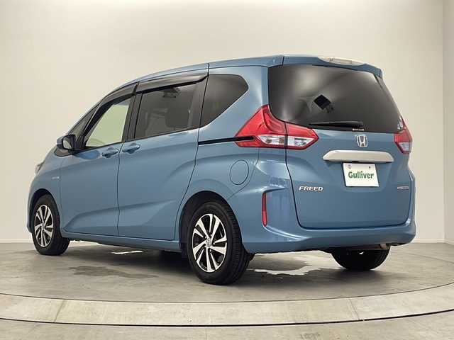 ホンダ フリード ハイブリット EX 大阪府 2018(平30)年 1.8万km ブルーホライゾンM ホンダ純正7インチナビ（VXM-184VFi)/フルセグTV　BT　DVD再生機能付　USB/バックカメラ/ETC/両側パワースライドドア/純正フロアマット/純正アルミホイール/3列シート/LEDヘッドライト/オートライト/Carrozzeria チェーンアップトゥイーター/クルーズコントロール/純正ドアバイザー/衝突軽減システム/スペアキー1本