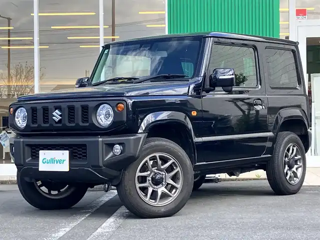 スズキ ジムニー XC 静岡県 2025(令7)年 1万km ブルーイッシュブラックパール3 エンジンスタートボタン/パワーステアリング/パワーウィンドウ/保証書/４ＷＤ/ターボ/アイドリングストップ/スマートキー/オートエアコン/クルーズコントロール/布シート/前席シートヒーター/背面タイヤ/純正アルミホイール/ＡＢＳ/横滑り防止装置/コーナーセンサー/センターデフロック/レーンキープアシスト/オートライト/オートマチックハイビーム/ダウンヒルアシストコントロール/Ｗ+サイドエアバッグ/衝突軽減システム