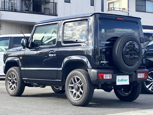 スズキ ジムニー XC 静岡県 2025(令7)年 1万km ブルーイッシュブラックパール3 エンジンスタートボタン/パワーステアリング/パワーウィンドウ/保証書/４ＷＤ/ターボ/アイドリングストップ/スマートキー/オートエアコン/クルーズコントロール/布シート/前席シートヒーター/背面タイヤ/純正アルミホイール/ＡＢＳ/横滑り防止装置/コーナーセンサー/センターデフロック/レーンキープアシスト/オートライト/オートマチックハイビーム/ダウンヒルアシストコントロール/Ｗ+サイドエアバッグ/衝突軽減システム