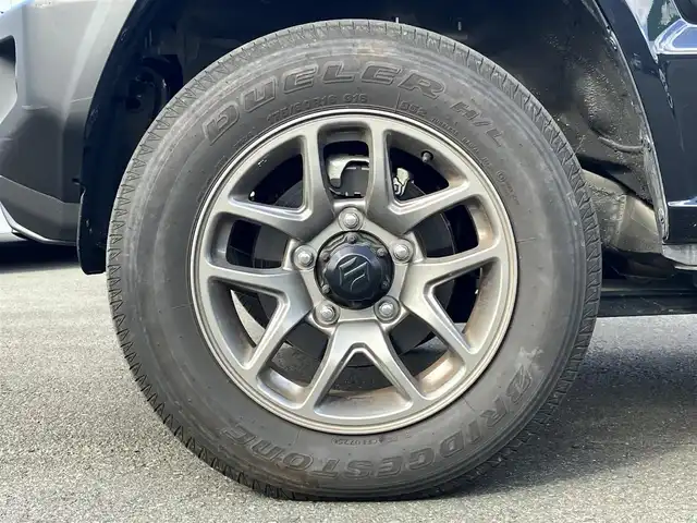 スズキ ジムニー XC 静岡県 2025(令7)年 1万km ブルーイッシュブラックパール3 エンジンスタートボタン/パワーステアリング/パワーウィンドウ/保証書/４ＷＤ/ターボ/アイドリングストップ/スマートキー/オートエアコン/クルーズコントロール/布シート/前席シートヒーター/背面タイヤ/純正アルミホイール/ＡＢＳ/横滑り防止装置/コーナーセンサー/センターデフロック/レーンキープアシスト/オートライト/オートマチックハイビーム/ダウンヒルアシストコントロール/Ｗ+サイドエアバッグ/衝突軽減システム