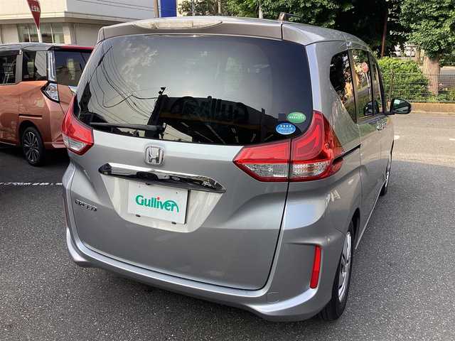 ホンダ フリード G ホンダセンシング 神奈川県 2018(平30)年 4万km ルナシルバーM 純正ナビ、TV/フリップダウンモニタ /スタッドレスタイヤ付き/ナビ装着用スペシャルパッケージ＋ETC車載器(ナビ連動)/Honda SENSING/Hondaスマートキーシステム＋イモビライザー/スライドドアイージークローザー(リア両側)/左側パワースライドドア/右側パワースライドドア/ LEDヘッドライト＋アクティブコーナリングライト/センターテーブル/Cパッケージ/コンフォートビューパッケージ