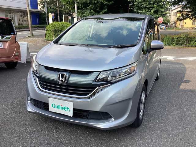 ホンダ フリード G ホンダセンシング 神奈川県 2018(平30)年 4万km ルナシルバーM 純正ナビ、TV/フリップダウンモニタ /スタッドレスタイヤ付き/ナビ装着用スペシャルパッケージ＋ETC車載器(ナビ連動)/Honda SENSING/Hondaスマートキーシステム＋イモビライザー/スライドドアイージークローザー(リア両側)/左側パワースライドドア/右側パワースライドドア/ LEDヘッドライト＋アクティブコーナリングライト/センターテーブル/Cパッケージ/コンフォートビューパッケージ