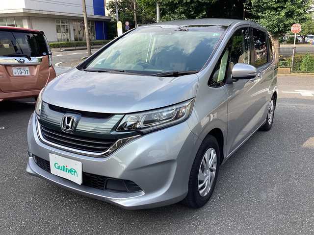 ホンダ フリード G ホンダセンシング 神奈川県 2018(平30)年 4万km ルナシルバーM 純正ナビ、TV/フリップダウンモニタ /スタッドレスタイヤ付き/ナビ装着用スペシャルパッケージ＋ETC車載器(ナビ連動)/Honda SENSING/Hondaスマートキーシステム＋イモビライザー/スライドドアイージークローザー(リア両側)/左側パワースライドドア/右側パワースライドドア/ LEDヘッドライト＋アクティブコーナリングライト/センターテーブル/Cパッケージ/コンフォートビューパッケージ