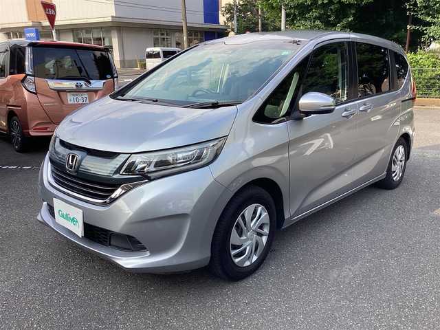 ホンダ フリード G ホンダセンシング 神奈川県 2018(平30)年 4万km ルナシルバーM 純正ナビ、TV/フリップダウンモニタ /スタッドレスタイヤ付き/ナビ装着用スペシャルパッケージ＋ETC車載器(ナビ連動)/Honda SENSING/Hondaスマートキーシステム＋イモビライザー/スライドドアイージークローザー(リア両側)/左側パワースライドドア/右側パワースライドドア/ LEDヘッドライト＋アクティブコーナリングライト/センターテーブル/Cパッケージ/コンフォートビューパッケージ
