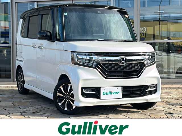 ホンダ Ｎ ＢＯＸ カスタム G L ホンダセンシング 静岡県 2018(平30)年 6.5万km プレミアムホワイトパールⅡ 純正ナビ/・CD/DVD/・MSV/SD/・FM/AM/・フルセグTV/・Bluetooth/・iPod/・USB/・HDMI/・AUX/ホンダセンシング/●衝突軽減ブレーキ〈CMBS〉/●誤発進抑制機能/●後方誤発進抑制機能/●歩行者事故低減ステアリング/●路外逸脱抑制機能/●ACC〈アダプティブ・クルーズ・コントロール〉/●LKAS〈車線維持支援システム〉/●オートハイビーム/●先行車発進お知らせ機能/●標識認識機能/主要装備/・バックカメラ/・片側パワースライドドア/・ドライブレコーダー/・サイドカーテンエアバッグ/・オートライト/・ＬＥＤヘッドライト/・フォグランプ/・横滑り防止装置/・ステアリングリモコン