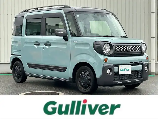 マツダ フレアワゴンタフスタイル ハイブリッドXS 富山県 2021(令3)年 5.9万km ベネチアンミストブルー 社外SDナビ(CN-RZ765W)/(AM/FM/CD/DVD/BT/USB)/フルセグTV/ルーフレール/レーダークルーズコントロール/レーンキープアシスト/衝突軽減システム/コーナーセンサー/オートマチックハイビーム/横滑り防止装置/盗難防止装置/前後ドライブレコーダー/両側パワースライドドア/シートヒーター　運転席＋助手席/ベンチシート/ルーフレール/LEDライト/フォグランプ/スマートキー×1/取扱説明書/保証書