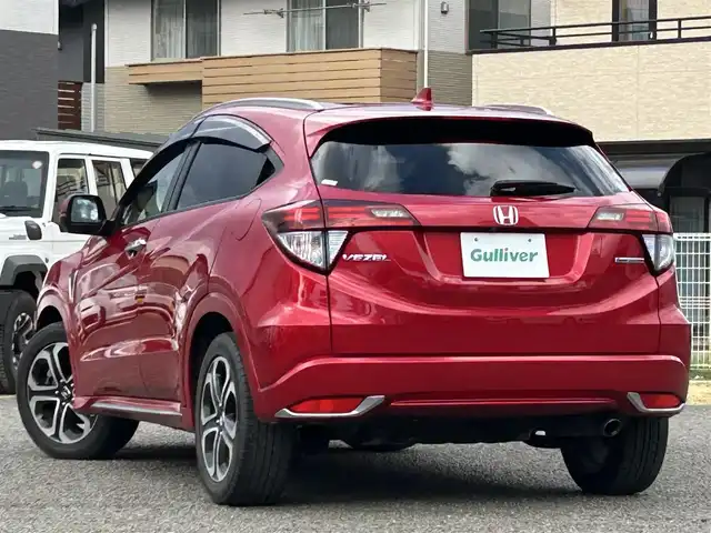 ホンダ ヴェゼル ハイブリッド 宮城県 2016(平28)年 9.7万km プレミアムクリスタルレッドM 純正ＳＤナビ（フルセグＴＶ、ＣＤ、ＤＶＤ、ＡＭ、ＦＭ、ＢＴ）//ドラレコ//純正ＡＷ//追従クルコン//純正フロアマット//ビルトインＥＴＣ//ＵＳＢポート//前席シートヒーター//バックカメラ//ワイパーデアイサー//電動格納ドアミラー//車線逸脱アラート//横滑り防止機能//プリクラッシュセーフティ