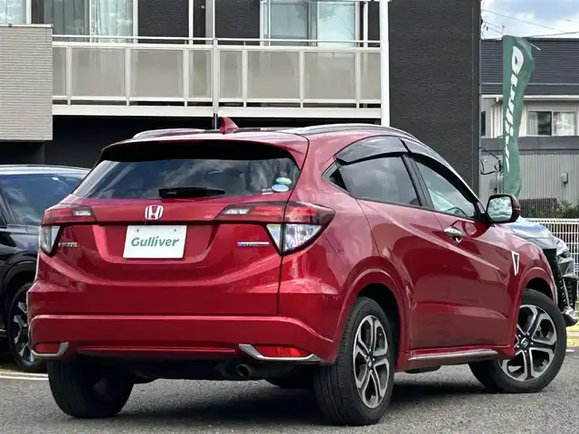 ホンダ ヴェゼル ハイブリッド 宮城県 2016(平28)年 9.7万km プレミアムクリスタルレッドM 純正ＳＤナビ（フルセグＴＶ、ＣＤ、ＤＶＤ、ＡＭ、ＦＭ、ＢＴ）//ドラレコ//純正ＡＷ//追従クルコン//純正フロアマット//ビルトインＥＴＣ//ＵＳＢポート//前席シートヒーター//バックカメラ//ワイパーデアイサー//電動格納ドアミラー//車線逸脱アラート//横滑り防止機能//プリクラッシュセーフティ