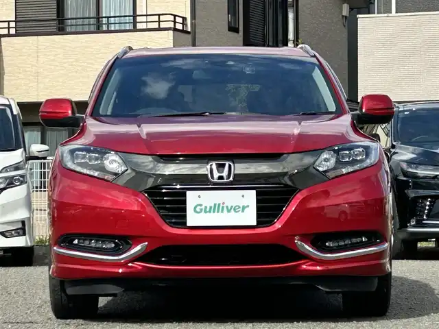 ホンダ ヴェゼル ハイブリッド 宮城県 2016(平28)年 9.7万km プレミアムクリスタルレッドM 純正ＳＤナビ（フルセグＴＶ、ＣＤ、ＤＶＤ、ＡＭ、ＦＭ、ＢＴ）//ドラレコ//純正ＡＷ//追従クルコン//純正フロアマット//ビルトインＥＴＣ//ＵＳＢポート//前席シートヒーター//バックカメラ//ワイパーデアイサー//電動格納ドアミラー//車線逸脱アラート//横滑り防止機能//プリクラッシュセーフティ