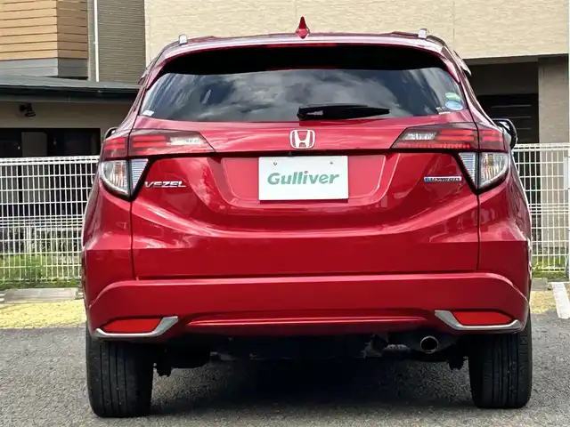 ホンダ ヴェゼル ハイブリッド 宮城県 2016(平28)年 9.7万km プレミアムクリスタルレッドM 純正ＳＤナビ（フルセグＴＶ、ＣＤ、ＤＶＤ、ＡＭ、ＦＭ、ＢＴ）//ドラレコ//純正ＡＷ//追従クルコン//純正フロアマット//ビルトインＥＴＣ//ＵＳＢポート//前席シートヒーター//バックカメラ//ワイパーデアイサー//電動格納ドアミラー//車線逸脱アラート//横滑り防止機能//プリクラッシュセーフティ