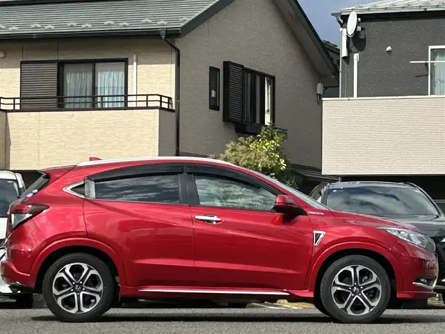 ホンダ ヴェゼル ハイブリッド 宮城県 2016(平28)年 9.7万km プレミアムクリスタルレッドM 純正ＳＤナビ（フルセグＴＶ、ＣＤ、ＤＶＤ、ＡＭ、ＦＭ、ＢＴ）//ドラレコ//純正ＡＷ//追従クルコン//純正フロアマット//ビルトインＥＴＣ//ＵＳＢポート//前席シートヒーター//バックカメラ//ワイパーデアイサー//電動格納ドアミラー//車線逸脱アラート//横滑り防止機能//プリクラッシュセーフティ