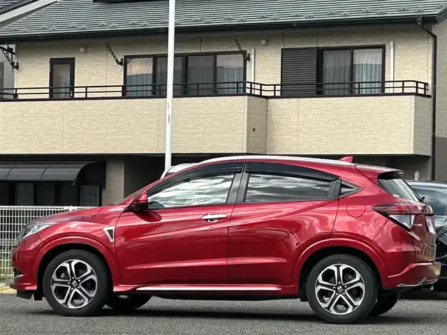 ホンダ ヴェゼル ハイブリッド 宮城県 2016(平28)年 9.7万km プレミアムクリスタルレッドM 純正ＳＤナビ（フルセグＴＶ、ＣＤ、ＤＶＤ、ＡＭ、ＦＭ、ＢＴ）//ドラレコ//純正ＡＷ//追従クルコン//純正フロアマット//ビルトインＥＴＣ//ＵＳＢポート//前席シートヒーター//バックカメラ//ワイパーデアイサー//電動格納ドアミラー//車線逸脱アラート//横滑り防止機能//プリクラッシュセーフティ