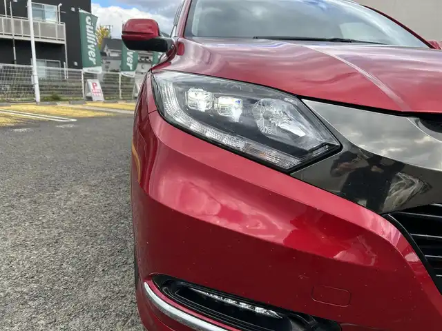 ホンダ ヴェゼル ハイブリッド 宮城県 2016(平28)年 9.7万km プレミアムクリスタルレッドM 純正ＳＤナビ（フルセグＴＶ、ＣＤ、ＤＶＤ、ＡＭ、ＦＭ、ＢＴ）//ドラレコ//純正ＡＷ//追従クルコン//純正フロアマット//ビルトインＥＴＣ//ＵＳＢポート//前席シートヒーター//バックカメラ//ワイパーデアイサー//電動格納ドアミラー//車線逸脱アラート//横滑り防止機能//プリクラッシュセーフティ