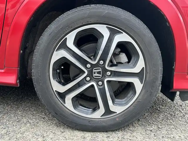 ホンダ ヴェゼル ハイブリッド 宮城県 2016(平28)年 9.7万km プレミアムクリスタルレッドM 純正ＳＤナビ（フルセグＴＶ、ＣＤ、ＤＶＤ、ＡＭ、ＦＭ、ＢＴ）//ドラレコ//純正ＡＷ//追従クルコン//純正フロアマット//ビルトインＥＴＣ//ＵＳＢポート//前席シートヒーター//バックカメラ//ワイパーデアイサー//電動格納ドアミラー//車線逸脱アラート//横滑り防止機能//プリクラッシュセーフティ