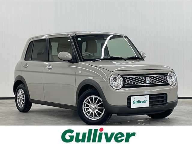 スズキ ラパン モード 長崎県 2020(令2)年 6.7万km フォーンベージュM 社外メモリナビ/（フルセグ/DVD/CD/BTA）/全方位カメラ装着車両（ナビ連動無し）/衝突軽減ブレーキ/レーンキープアシスト/横滑り防止装置/社外13インチアルミホイール/純正LEDヘッドライト/シートヒーター（D+N席）/ステアリングスイッチ/オートライト/スペアキー/保証書/取扱説明書