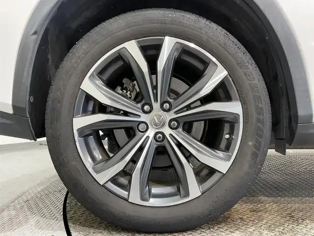 レクサス ＲＸ 450h バージョンL 愛知県 2017(平29)年 9万km ソニッククォーツ 純正ナビ/（AM/FM/CD・DVD再生/SD/USB/Bluetooth//AUX/フルセグTV）/バックカメラ/レクサスセーフティーシステム/　　-衝突軽減ブレーキ/　　-レーンディパーチャーアラート（LDA)/　　-レーダークルーズコントロール（ACC)/　　-発信遅れ告知機能/ビルトインETC2.0/ドライブレコーダー/ブラインドスポットモニター（BSM)/ヘッドアップディスプレイ（HUD)/ステアリングヒーター/シートヒーター/シートエアコン/メモリー付電動パワーシート/電動リアゲード/LEDヘッドライト/コーナーセンサー