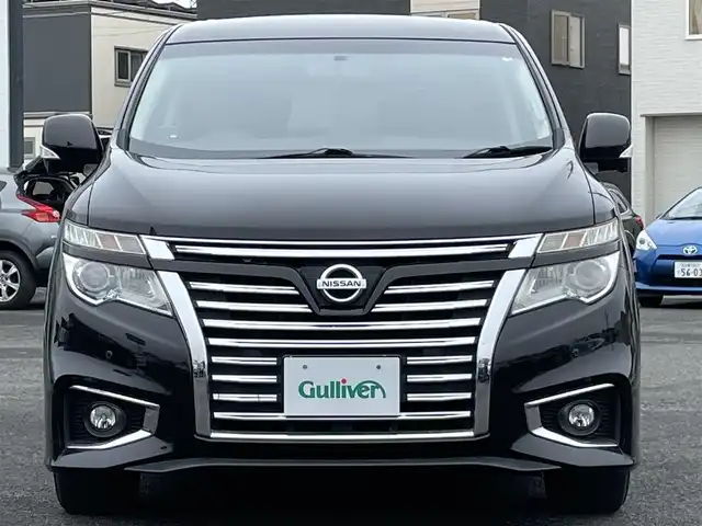 日産 エルグランド 350ハイウェイスター 道央・札幌 2014(平26)年 13万km ファントムブラック ４WD/純正メーカーナビ/AM/FM/BT/フルセグ/純正フリップダウンモニター/横滑り防止装置/クルーズコントロール/クリアランスソナー/アラウンドビューモニター/ビルトインETC/ECOMODE/センターデフロック/両側パワースライドドア/パワーバックドア/N席/２列目オットマン/ハーフレザーシート/革巻きステアリング/ステアリングリモコン/AC100V/MTモード付AT/レーダー探知機/プッシュスタート/スマートキー/HIDヘッドライト/オートライト/フォグランプ/電動格納ミラー/ウィンカーミラー/純正フロアマット/ドアバイザー/純正エンジンスターター