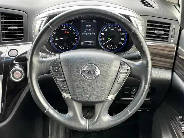 日産 エルグランド 350ハイウェイスター 道央・札幌 2014(平26)年 13万km ファントムブラック ４WD/純正メーカーナビ/AM/FM/BT/フルセグ/純正フリップダウンモニター/横滑り防止装置/クルーズコントロール/クリアランスソナー/アラウンドビューモニター/ビルトインETC/ECOMODE/センターデフロック/両側パワースライドドア/パワーバックドア/N席/２列目オットマン/ハーフレザーシート/革巻きステアリング/ステアリングリモコン/AC100V/MTモード付AT/レーダー探知機/プッシュスタート/スマートキー/HIDヘッドライト/オートライト/フォグランプ/電動格納ミラー/ウィンカーミラー/純正フロアマット/ドアバイザー/純正エンジンスターター