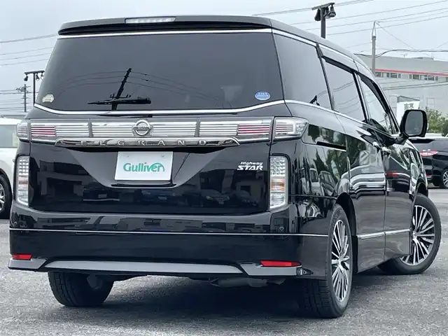 日産 エルグランド 350ハイウェイスター 道央・札幌 2014(平26)年 13万km ファントムブラック ４WD/純正メーカーナビ/AM/FM/BT/フルセグ/純正フリップダウンモニター/横滑り防止装置/クルーズコントロール/クリアランスソナー/アラウンドビューモニター/ビルトインETC/ECOMODE/センターデフロック/両側パワースライドドア/パワーバックドア/N席/２列目オットマン/ハーフレザーシート/革巻きステアリング/ステアリングリモコン/AC100V/MTモード付AT/レーダー探知機/プッシュスタート/スマートキー/HIDヘッドライト/オートライト/フォグランプ/電動格納ミラー/ウィンカーミラー/純正フロアマット/ドアバイザー/純正エンジンスターター