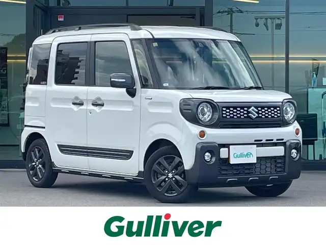 スズキ スペーシア ギア HYBRID XZ 東京都 2023(令5)年 0.3万km ピュアホワイトP スズキセーフティサポート/・デュアルカメラブレーキサポート/・車線逸脱警報機能/・先行車発進お知らせ機能/・誤発進抑制機能/・アダプティブクルーズコントロール/・コーナーセンサー/・ヘッドアップディスプレイ/プッシュスタート/アイドリングストップ/社外10型ディスプレイオーディオ/両側パワースライドドア/シートヒーター/パーソナルテーブル/スリムサーキュレーター/LEDヘッドライト/ルーフレール/14インチ純正アルミホイール/スマートキー