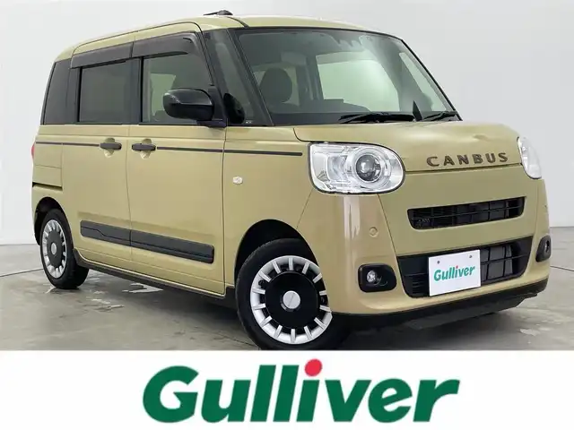 ダイハツ ムーヴ キャンバス セオリー G 富山県 2023(令5)年 1万km サンドベージュメタリック 純正ディスプレイオーディオ（ｂｌｕｅｔｏｏｔｈ　ＣａｒＰｌａｙ）　/フルセグTV/ＨＤＭＩ　/バックカメラ　/前後コーナーセンサー　/ＥＴＣ　/前席シートヒーター　/両側パワースライドドア　/前ドラレコ　/衝突軽減ブレーキ　/車線逸脱抑制/先行車発進お知らせ/オートライト　/ＬＥＤヘッドライト/フォグ/スマートキー/プッシュスタート/オートホールド/社外マット・純正バイザー/横滑防止装置