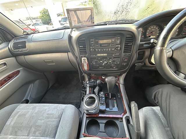 トヨタ ランドクルーザー VX－LTD 愛知県 1999(平11)年 18.2万km 緑 ワンオーナー/4WD/社外ナビ/純正オーディオプレーヤー(AM/CD)/クルーズコントロール/ETC/ドアバイザー/ルーフキャリア/取説/保証書/スペアキー