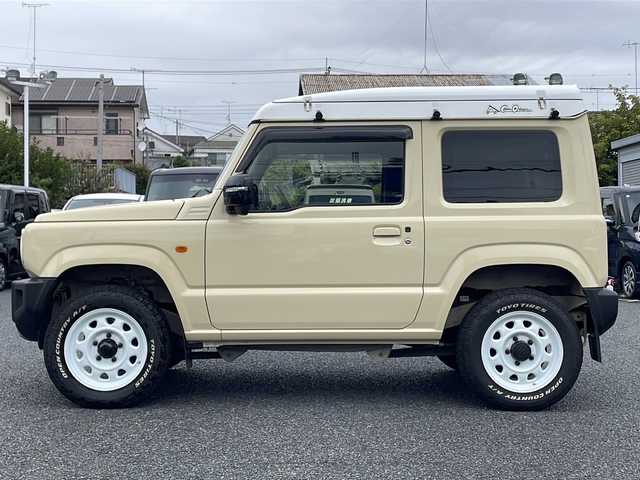 スズキ ジムニー XC 東京都 2023(令5)年 1.1万km シフォンアイボリーM ルーフテントキャノティエＪ３/デュアルセンサーブレーキサポート/ディスプレイオーディオ/バックカメラ/ETC/プッシュスタート/クルーズコントロール/保証書/取説書/スペアキスマートキー