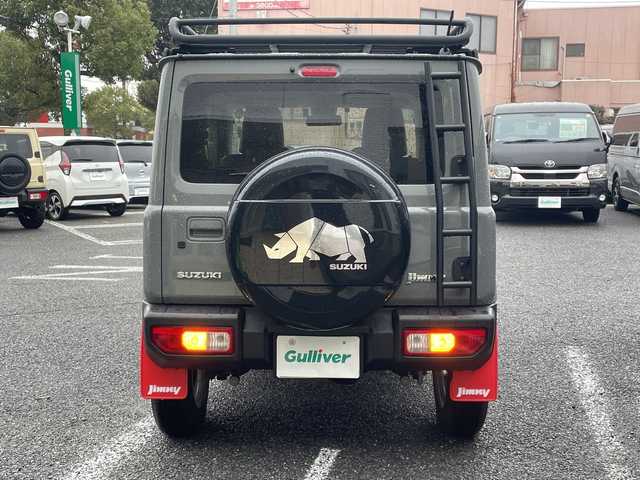スズキ ジムニー XC 千葉県 2023(令5)年 0.6万km ミディアムグレー 8型ナビCN-RZ875　バックカメラ　革調カバー　シートヒーター　ドラレコ　クルコン　コンビハンドル　ルーフラック　リアラダー　LEDライト　オートライト　外グリル　セーフティサポート　ラバーマット