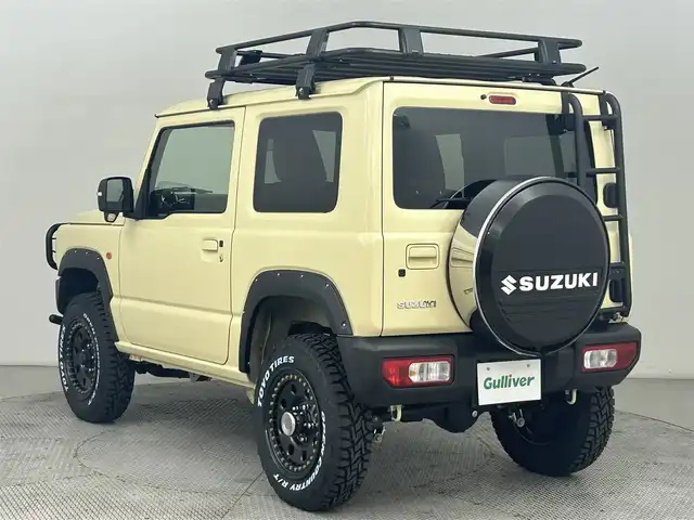 スズキ ジムニー XC 道央・札幌 2024(令6)年 0.4万km シフォンアイボリーM ・ＧＩＧＥＡＲオフロード仕様/・大型グリルガード/・ルーフラック/・リアラダー/・１．５インチリフトアップ（純正車内）/・オーバーフェンダー/・10インチフローティングナビ/・ブラウンキルティングレザーシートカバー/・シートヒーター/・衝突被害軽減ブレーキ/・レーンキープアシスト/・クルーズコントロール/・オートハイビーム/・ヘッドライトウォッシャー/・プッシュスタート/・スマートキー/・横滑り防止装置/・METAL ROCK 16インチビートリングホイール/・TOYO OPEN COUNTRY RT185/85R16