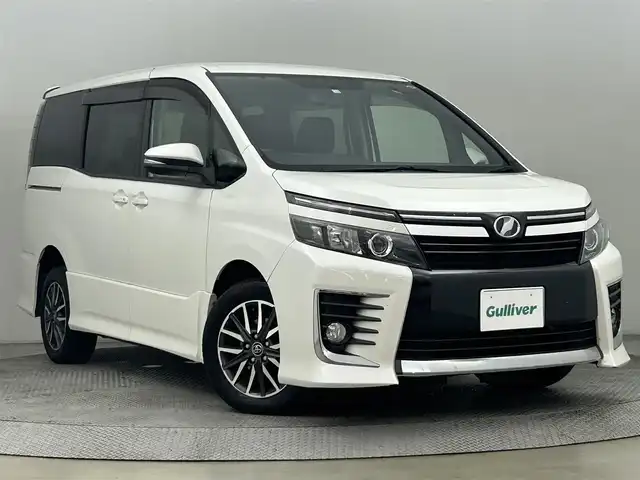 トヨタ ヴォクシー ZS 道央・札幌 2014(平26)年 12万km ホワイトパールクリスタルシャイン ・4WD/・寒冷地仕様/・純正メモリナビ/・フルセグ/BT/CD/DVD/・バックカメラ/・両側パワースライドドア/・アイドリングストップ/・純正エンジンスターター/・ドアロック連動ミラー/・ecoモード/・横滑り防止装置/・ステアリングスイッチ/・オートライト/・オートエアコン/・ドアロック連動ミラー/・スマートキー/・プッシュスタート
