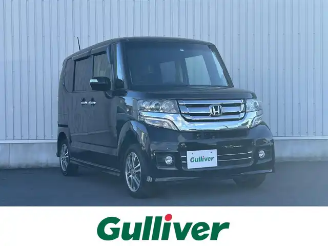 ホンダ Ｎ ＢＯＸ カスタム G Lパッケージ 神奈川県 2015(平27)年 4.9万km スマートブラック ・4WD/・プッシュスタート/・社外ナビ（AM/FM/TV/CD/DVD/Bluetooth)/・片側パワースライドドア/・純正アルミ14インチ/・純正エンジンスターター/・前席シートヒーター/・スマートキー/・オートライト/・フォグライト/・純正フロアマット/・横滑り防止/・ETC/・ステアリングスイッチ/・リアワイパー