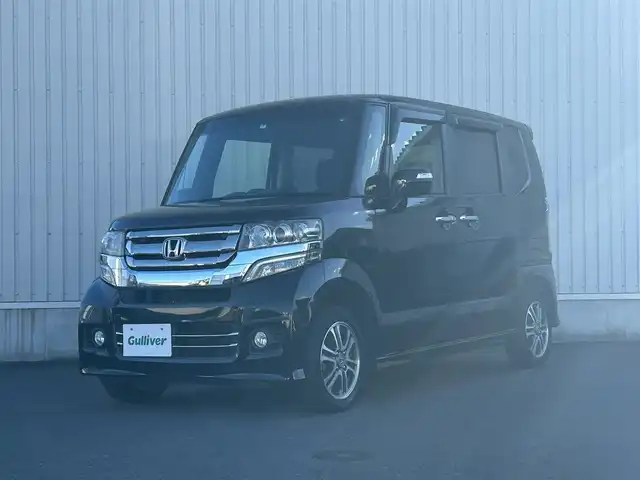 ホンダ Ｎ ＢＯＸ カスタム G Lパッケージ 神奈川県 2015(平27)年 4.9万km スマートブラック ・4WD/・プッシュスタート/・社外ナビ（AM/FM/TV/CD/DVD/Bluetooth)/・片側パワースライドドア/・純正アルミ14インチ/・純正エンジンスターター/・前席シートヒーター/・スマートキー/・オートライト/・フォグライト/・純正フロアマット/・横滑り防止/・ETC/・ステアリングスイッチ/・リアワイパー