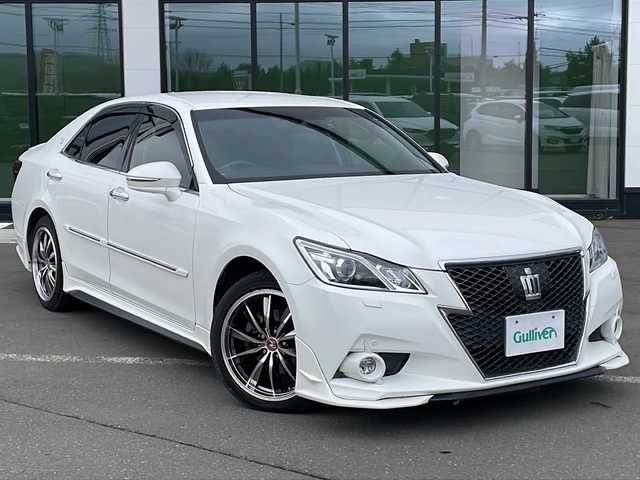 トヨタ クラウン アスリート G i－Four 岩手県 2013(平25)年 10.7万km ホワイトパールクリスタルシャイン ・4WD/・純正HDDナビ/【FM/AM.CD.DVD.HDD.BT.フルセグ】/・バックカメラ/・プリクラッシュセーフティ/・インテリジェントクリアランスソナー/・追従式クルーズコントロール/・純正エンジンスターター/・前席パワーシート/・シートヒーター/エアーシート/・LEDヘッドライト/・フォグライト/・オートライト/・オートマチックハイビーム/・ヘッドランプクリーナースイッチ/・革巻きステアリング/・ステアリングスイッチ/・MTモード付At/・ビルトインETC/・電格ウィンカーミラー/・ドアバイザー