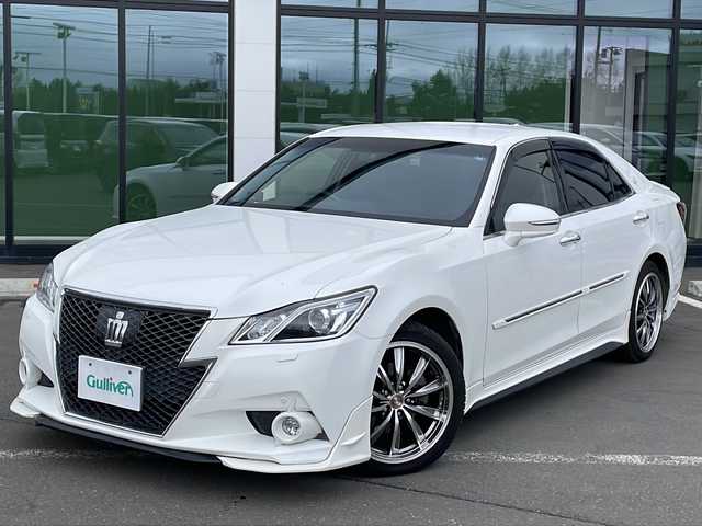 トヨタ クラウン アスリート G i－Four 岩手県 2013(平25)年 10.7万km ホワイトパールクリスタルシャイン ・4WD/・純正HDDナビ/【FM/AM.CD.DVD.HDD.BT.フルセグ】/・バックカメラ/・プリクラッシュセーフティ/・インテリジェントクリアランスソナー/・追従式クルーズコントロール/・純正エンジンスターター/・前席パワーシート/・シートヒーター/エアーシート/・LEDヘッドライト/・フォグライト/・オートライト/・オートマチックハイビーム/・ヘッドランプクリーナースイッチ/・革巻きステアリング/・ステアリングスイッチ/・MTモード付At/・ビルトインETC/・電格ウィンカーミラー/・ドアバイザー