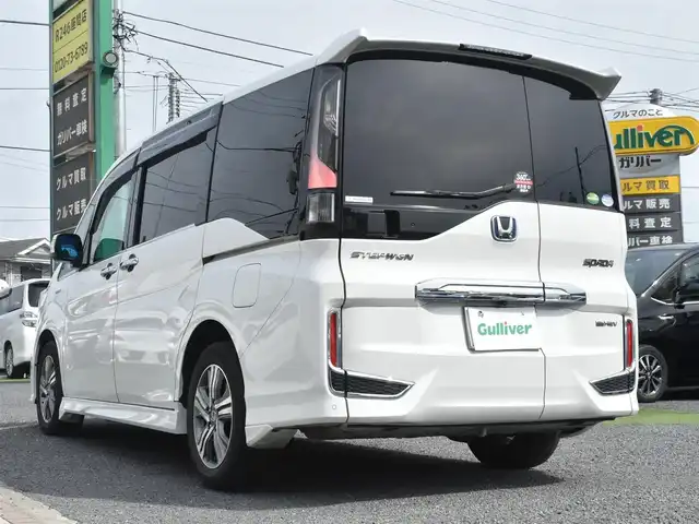 ホンダ ステップワゴン スパーダ eHEV G EXホンダS 神奈川県 2021(令3)年 7.5万km プラチナホワイトパール ナビ装着用スペシャルパッケージ＋ETC2.0車載器(ナビ連動)/マルチビューカメラシステム/Honda SENSING/1列目シート用i-サイドエアバッグシステム＋サイドカーテンエアバッグシステム(1-3列目シート対応)/わくわくゲート/トリプルゾーンコントロール・フルオートエアコンディショナー/16インチアルミホイール/専用インテリア/本革シート/運転席＆助手席シートヒーター/AC電源1500W/パフォーマンスダンパー純正メモリナビ/フルセグテレビ/全方位カメラ/後席モニター/両側パワースライドドア/スマートミラー/ETC2.0/LEDヘッドライト/ドライブレコーダー前後/取説/ナビ説/記録(R.4.5.6)/スペアスマートキー