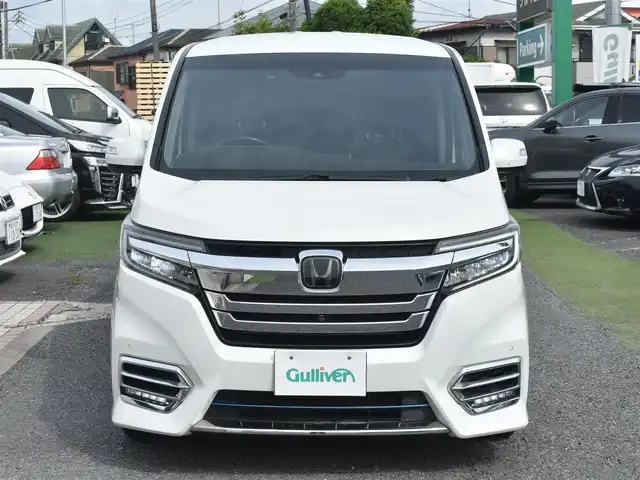 ホンダ ステップワゴン スパーダ eHEV G EXホンダS 神奈川県 2021(令3)年 7.5万km プラチナホワイトパール ナビ装着用スペシャルパッケージ＋ETC2.0車載器(ナビ連動)/マルチビューカメラシステム/Honda SENSING/1列目シート用i-サイドエアバッグシステム＋サイドカーテンエアバッグシステム(1-3列目シート対応)/わくわくゲート/トリプルゾーンコントロール・フルオートエアコンディショナー/16インチアルミホイール/専用インテリア/本革シート/運転席＆助手席シートヒーター/AC電源1500W/パフォーマンスダンパー純正メモリナビ/フルセグテレビ/全方位カメラ/後席モニター/両側パワースライドドア/スマートミラー/ETC2.0/LEDヘッドライト/ドライブレコーダー前後/取説/ナビ説/記録(R.4.5.6)/スペアスマートキー