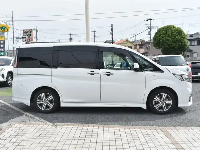 ホンダ ステップワゴン スパーダ eHEV G EXホンダS 神奈川県 2021(令3)年 7.5万km プラチナホワイトパール ナビ装着用スペシャルパッケージ＋ETC2.0車載器(ナビ連動)/マルチビューカメラシステム/Honda SENSING/1列目シート用i-サイドエアバッグシステム＋サイドカーテンエアバッグシステム(1-3列目シート対応)/わくわくゲート/トリプルゾーンコントロール・フルオートエアコンディショナー/16インチアルミホイール/専用インテリア/本革シート/運転席＆助手席シートヒーター/AC電源1500W/パフォーマンスダンパー純正メモリナビ/フルセグテレビ/全方位カメラ/後席モニター/両側パワースライドドア/スマートミラー/ETC2.0/LEDヘッドライト/ドライブレコーダー前後/取説/ナビ説/記録(R.4.5.6)/スペアスマートキー