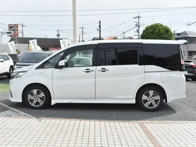 ホンダ ステップワゴン スパーダ eHEV G EXホンダS 神奈川県 2021(令3)年 7.5万km プラチナホワイトパール ナビ装着用スペシャルパッケージ＋ETC2.0車載器(ナビ連動)/マルチビューカメラシステム/Honda SENSING/1列目シート用i-サイドエアバッグシステム＋サイドカーテンエアバッグシステム(1-3列目シート対応)/わくわくゲート/トリプルゾーンコントロール・フルオートエアコンディショナー/16インチアルミホイール/専用インテリア/本革シート/運転席＆助手席シートヒーター/AC電源1500W/パフォーマンスダンパー純正メモリナビ/フルセグテレビ/全方位カメラ/後席モニター/両側パワースライドドア/スマートミラー/ETC2.0/LEDヘッドライト/ドライブレコーダー前後/取説/ナビ説/記録(R.4.5.6)/スペアスマートキー